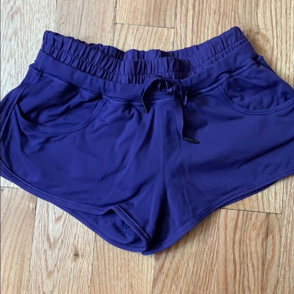 Purple Lululemon running shorts